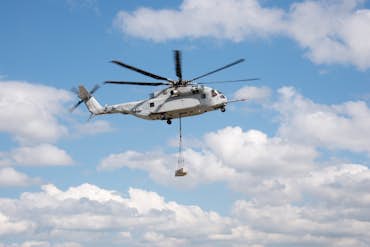 How Aerial Crane Helicopters Suspend, Support and Hoist Utility and Construction Cargo