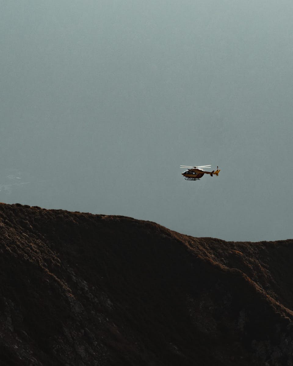 Helicopter flying to remote area.